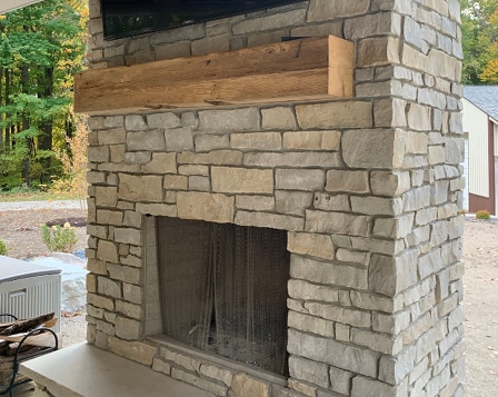 Sandman stone fireplace