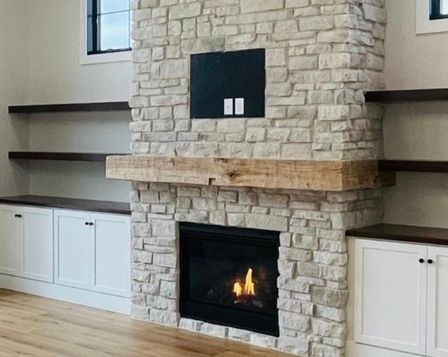 Sandman stone fireplace