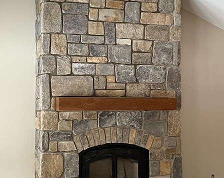 Sandman stone fireplace